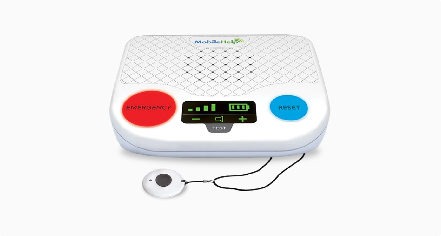 A white medical alert device with a digital screen, emergency button, and wearable button.