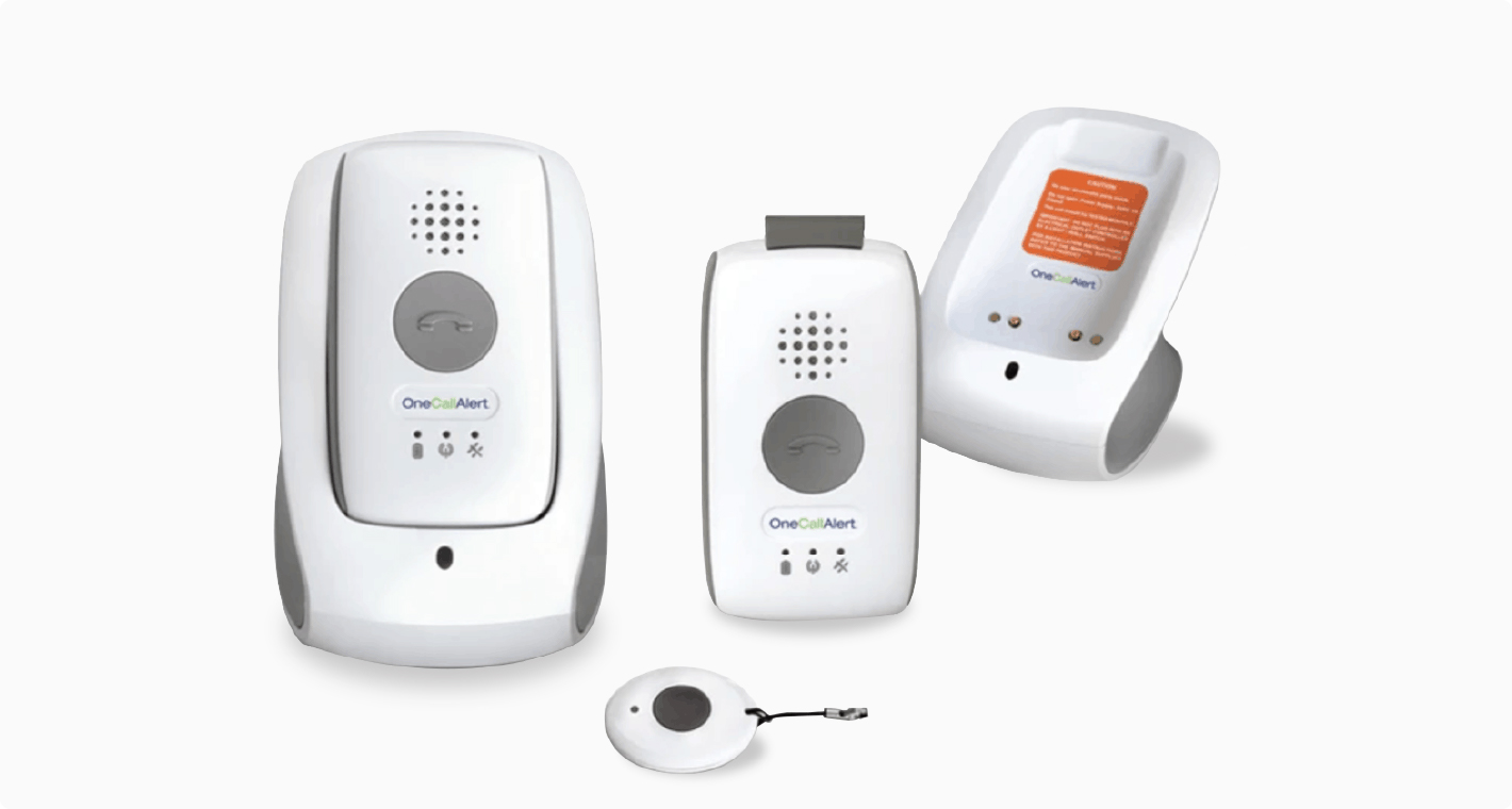 Several white medical alert devices shown, including tabletop docks with removable buttons and a wearable emergency button.