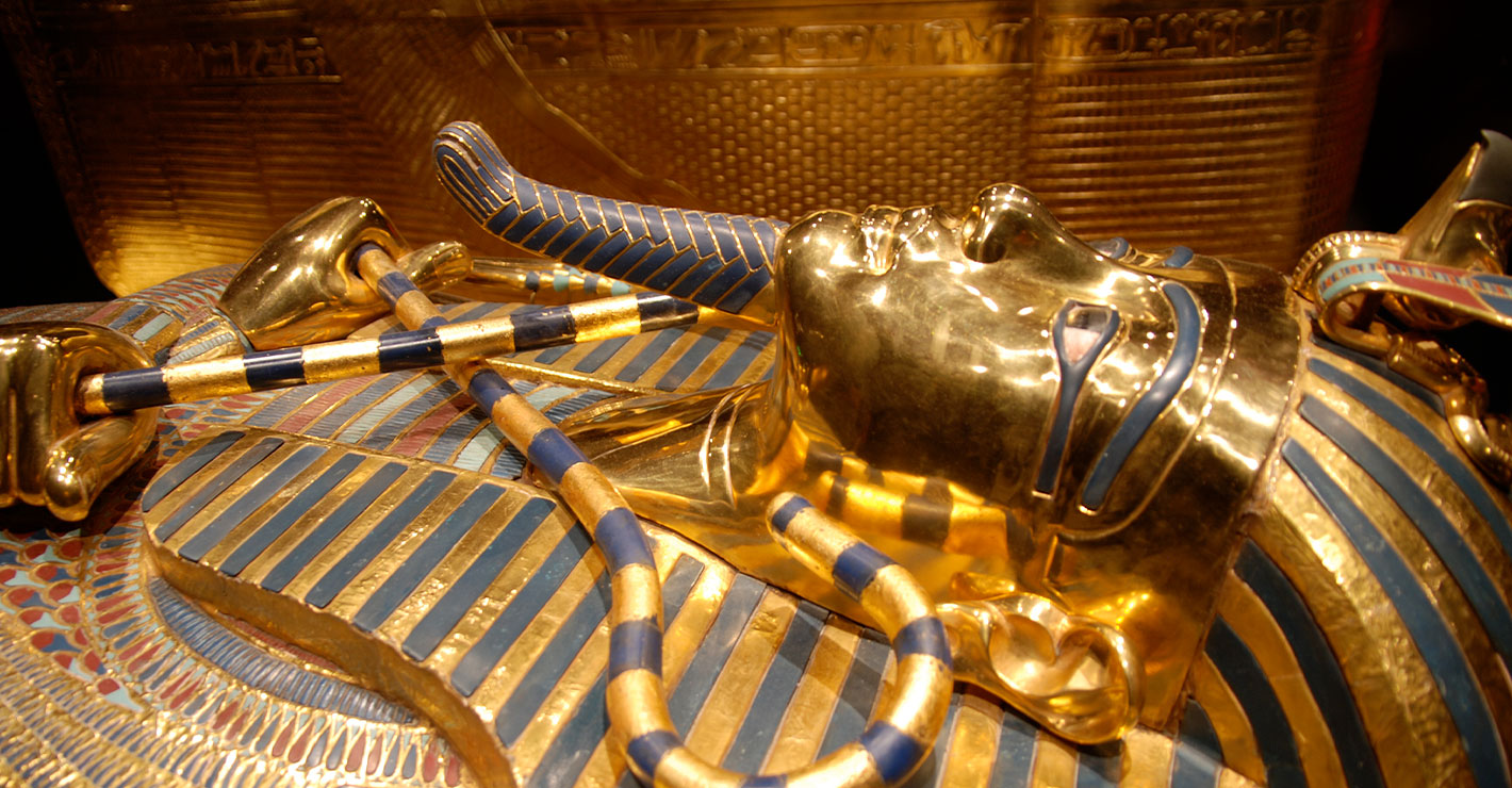A photo of a gold pharaohs coffin