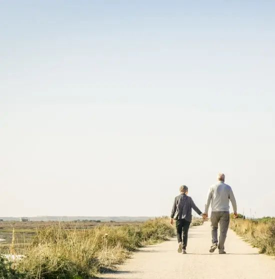 A couple walking on a trail