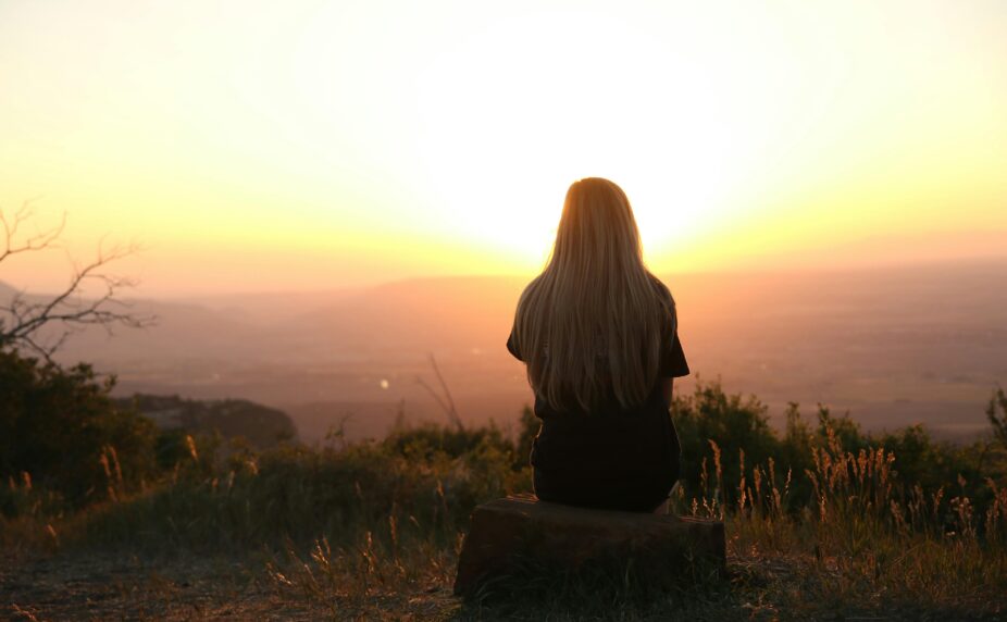 Woman looking at a sunset