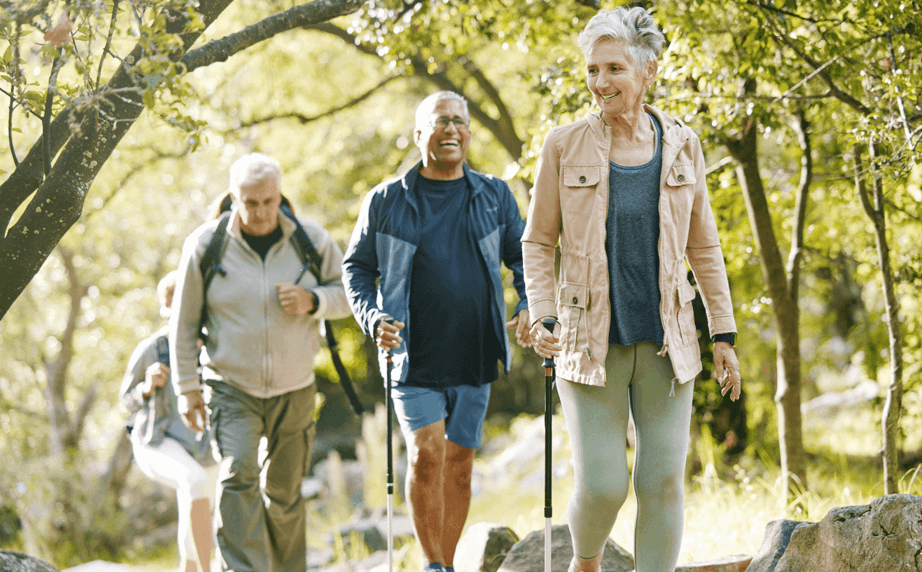 An image of elderly people outside walking