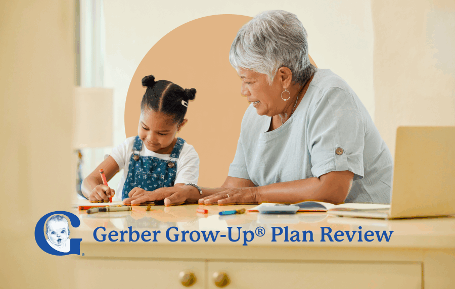 Black senior woman helping young Black girl with her coloring at a table. Gerber logo is overlaid.