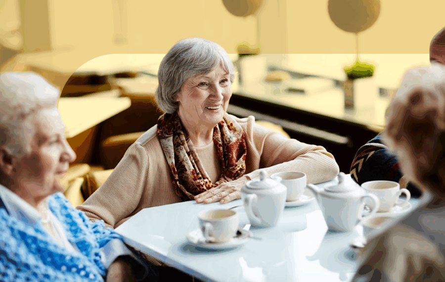 women sitting around a table.